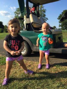 2 children smile after having their golf cart automobile repaired in warrenton